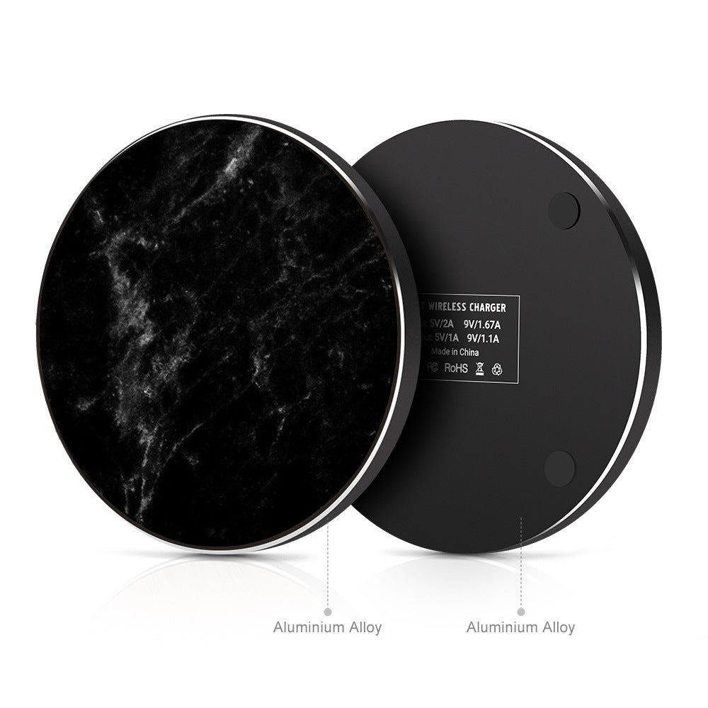 "Elegant black marble-patterned wireless charging pad on a clean white background, minimalist tech accessory for desk setup."