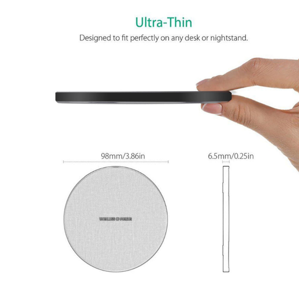 "Super slim wireless charger being held by a hand, showing compact size and dimensions, ideal minimalist travel tech accessory."