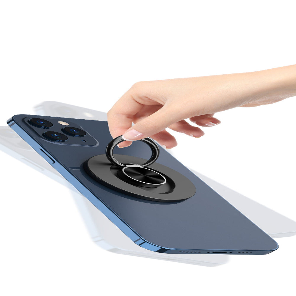 "Hand holding a mobile phone with a circular ring stand accessory on a white background, minimalist phone grip for drop prevention."