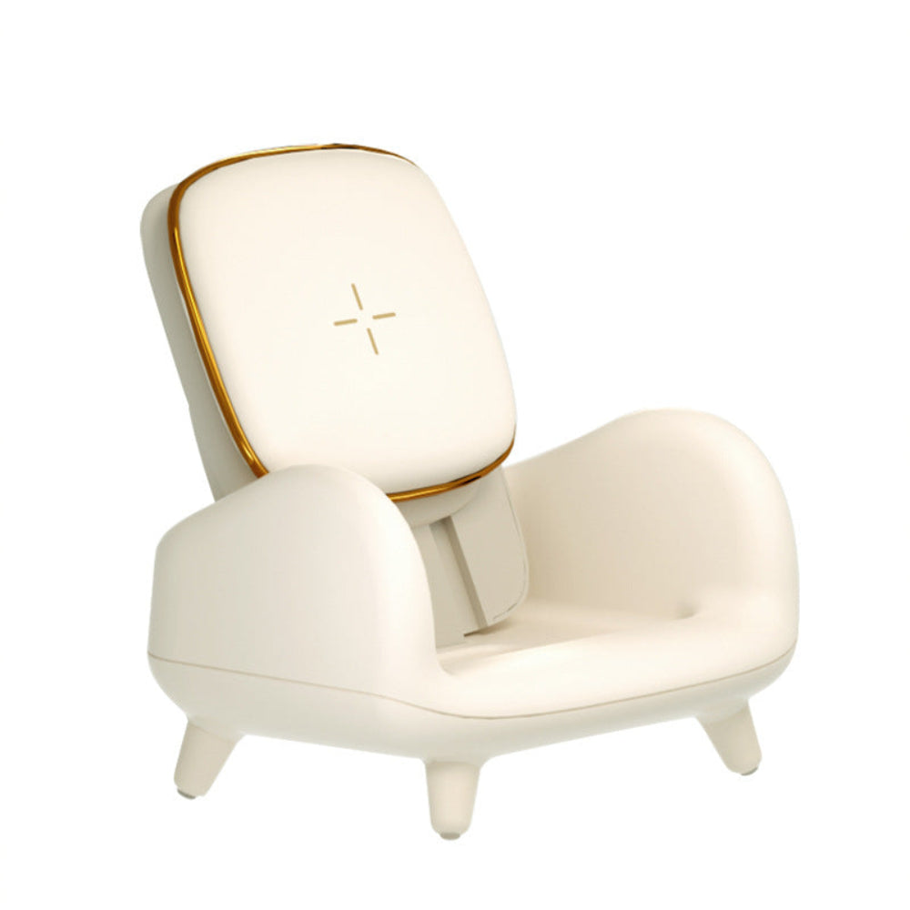 "Sofa-style wireless phone charger with luxury gold accents on a clean white background"