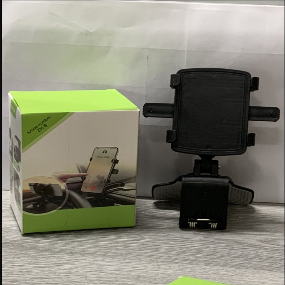 "Black car phone holder and packaging box displayed on a dual-tone gray background."