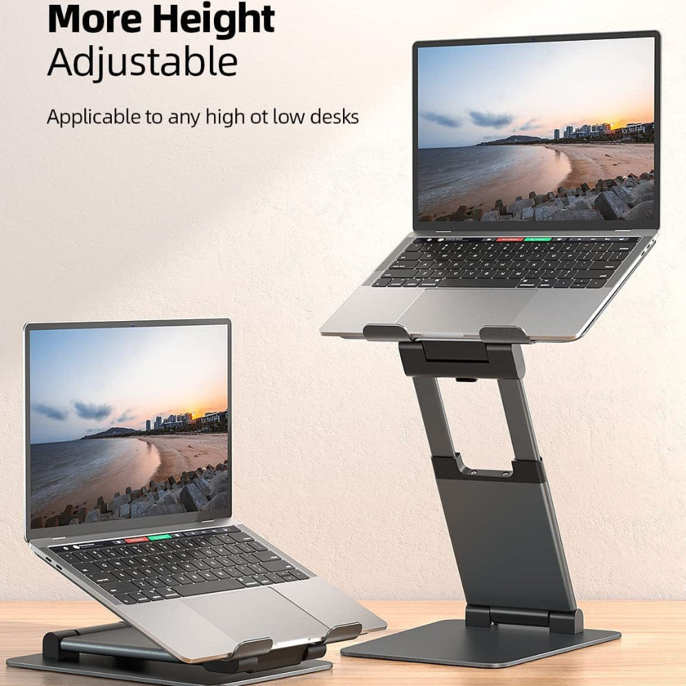Adjustable laptop stand with two laptops on a desk, showing beach scenery on screens.