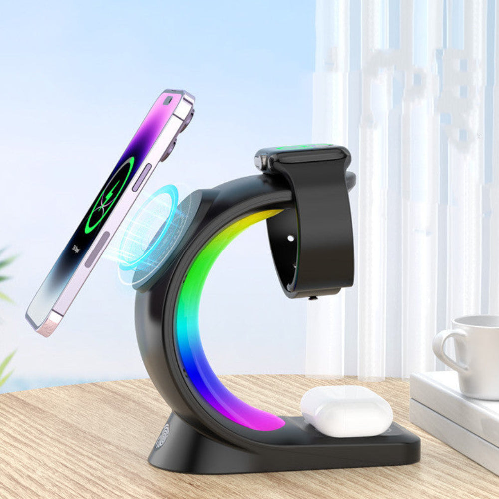 "Black wireless charging stand holding a smartphone, smartwatch, and earbud case on a professional office desk background."