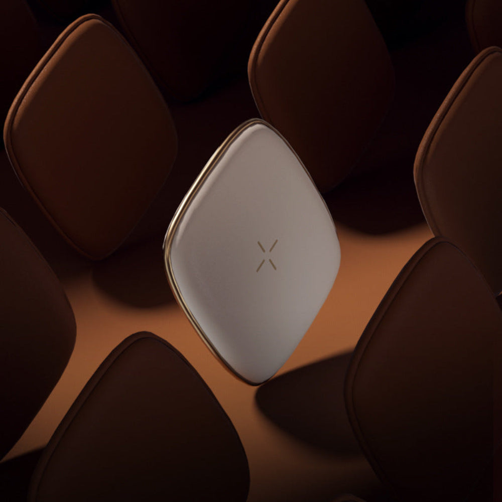 "Minimalist square wireless charging pad on a wooden aesthetic stand"