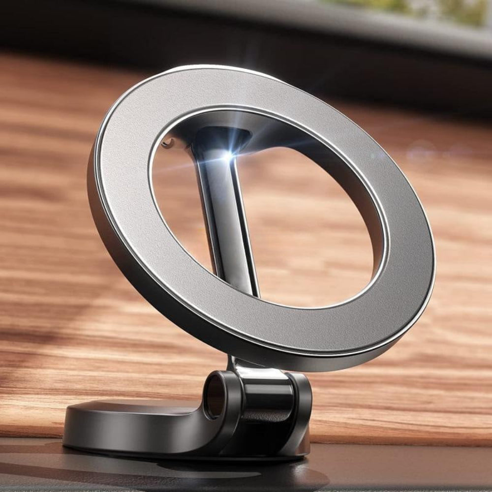 "Metallic silver LED ring light for photography and vlogging, sitting on a natural wood texture background, highlighting its premium build."