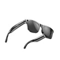 "Premium black eyewear with reflective UV protection lenses, minimalist fashion accessory on a plain white background for product catalog."