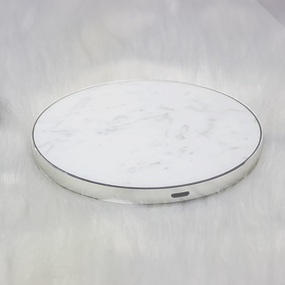 "Premium round marble-textured surface with grey veining on a clean white background, minimalist aesthetic for home or office."